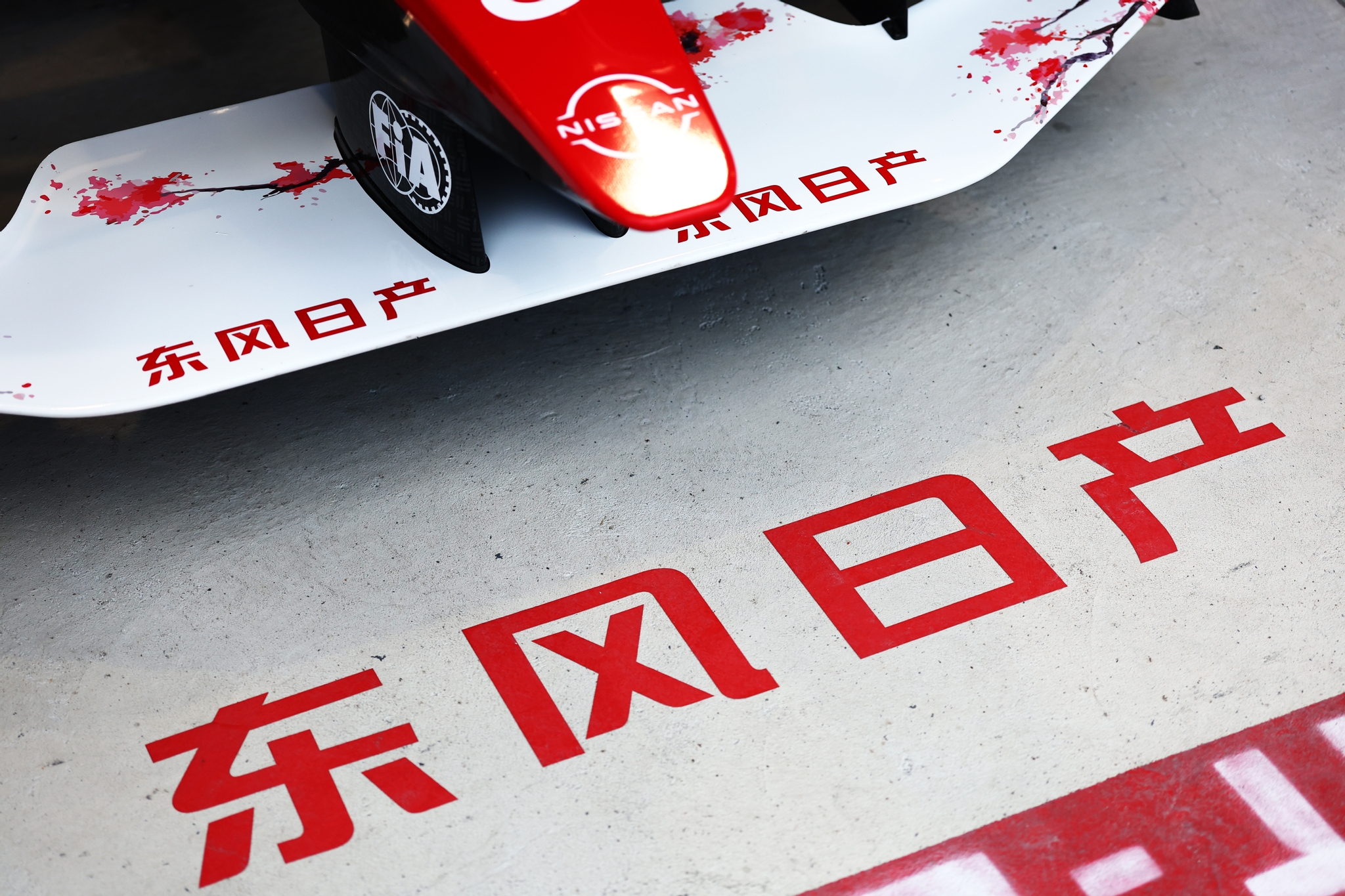 Chinese characters on the floor of the Nissan Formula E Team garage duri