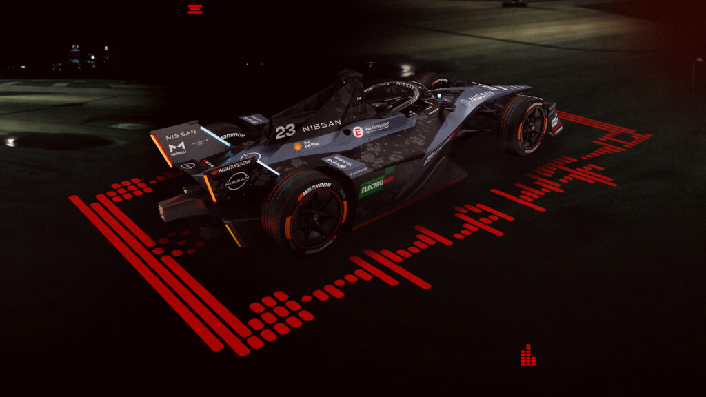 Side/rear image of the #23 Nissan e-4ORCE 05 with the unique one-off NISMO livery on the car.