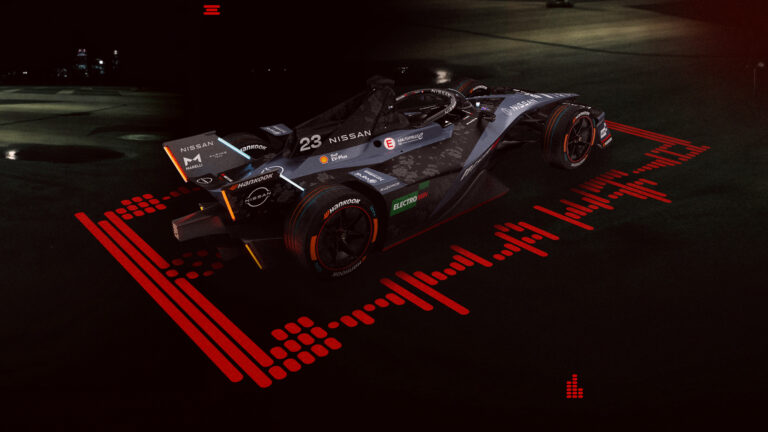 Side/rear image of the #23 Nissan e-4ORCE 05 with the unique one-off NISMO livery on the car.