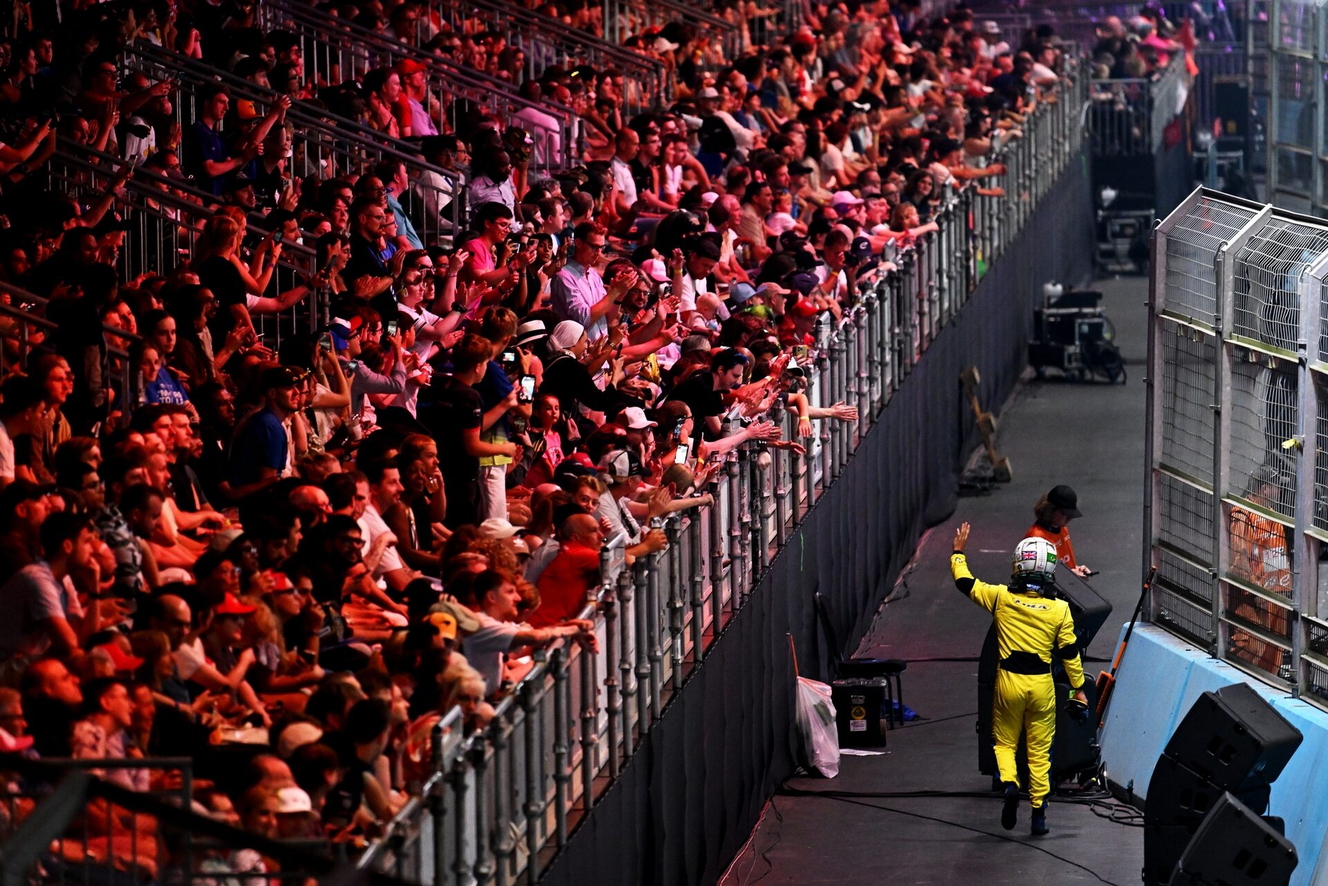 Lucas di Grassi de Brasil and Lola Yamaha ABT Formula E Team waves to the crowd after retiring duran
